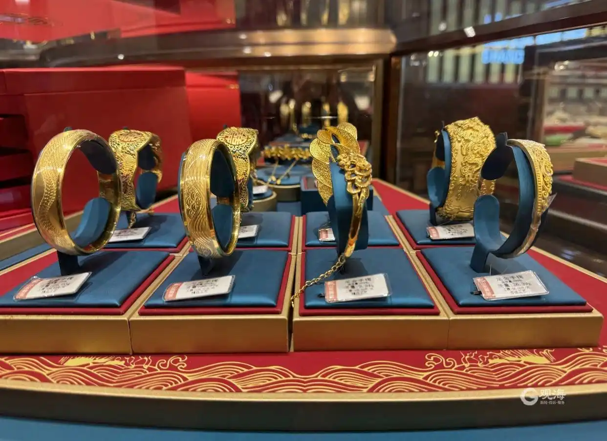 青岛黄金饰品价格_生肖龙金饰销售火爆_春节黄金消费热